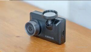 Garmin Dash Cam X installed in car windshield showing ADAS alerts and 4K video capture